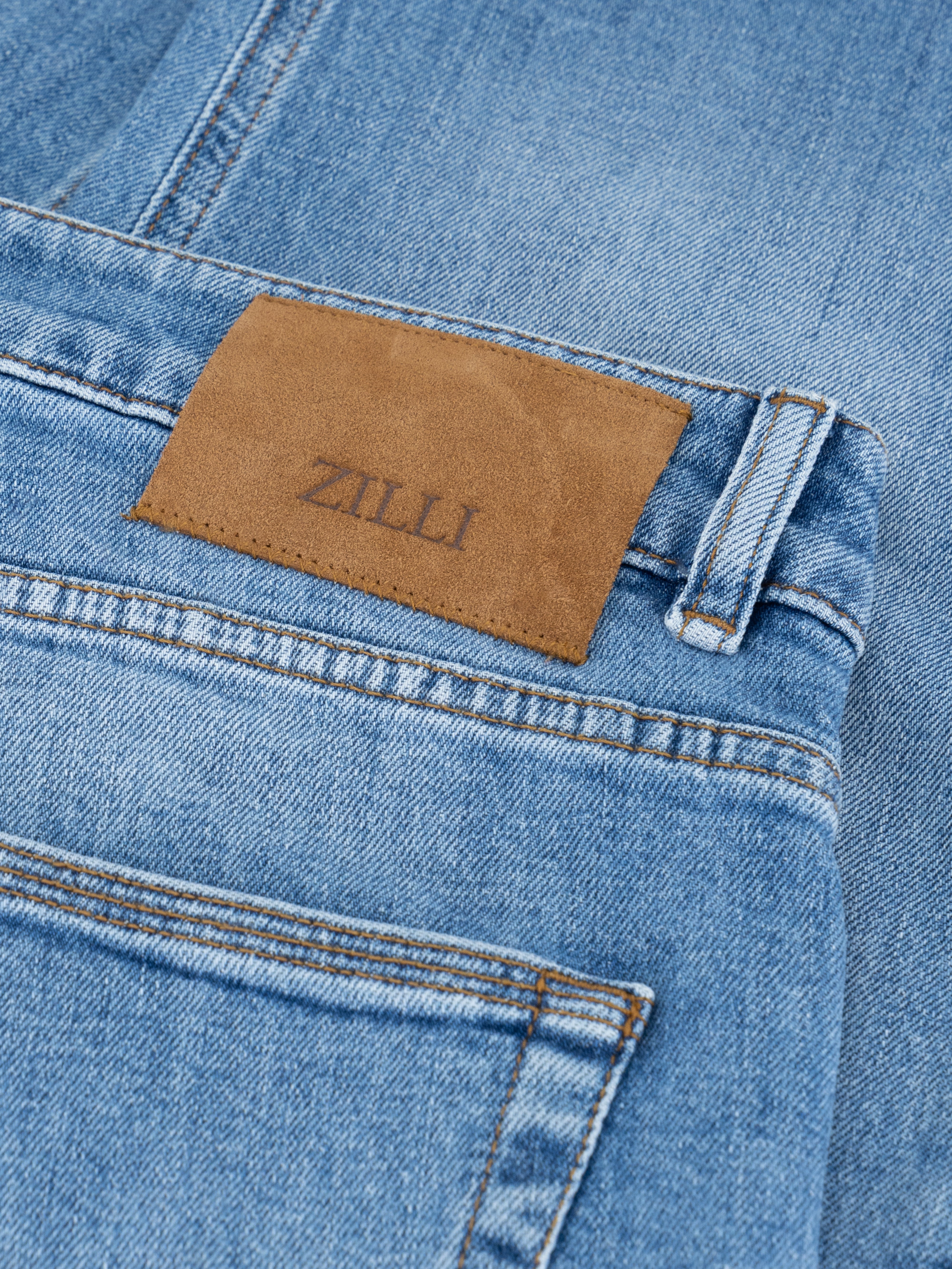 Джинсы из хлопкового денима средней стирки