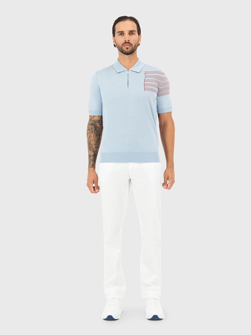 Поло на молнии с надписью Zilli