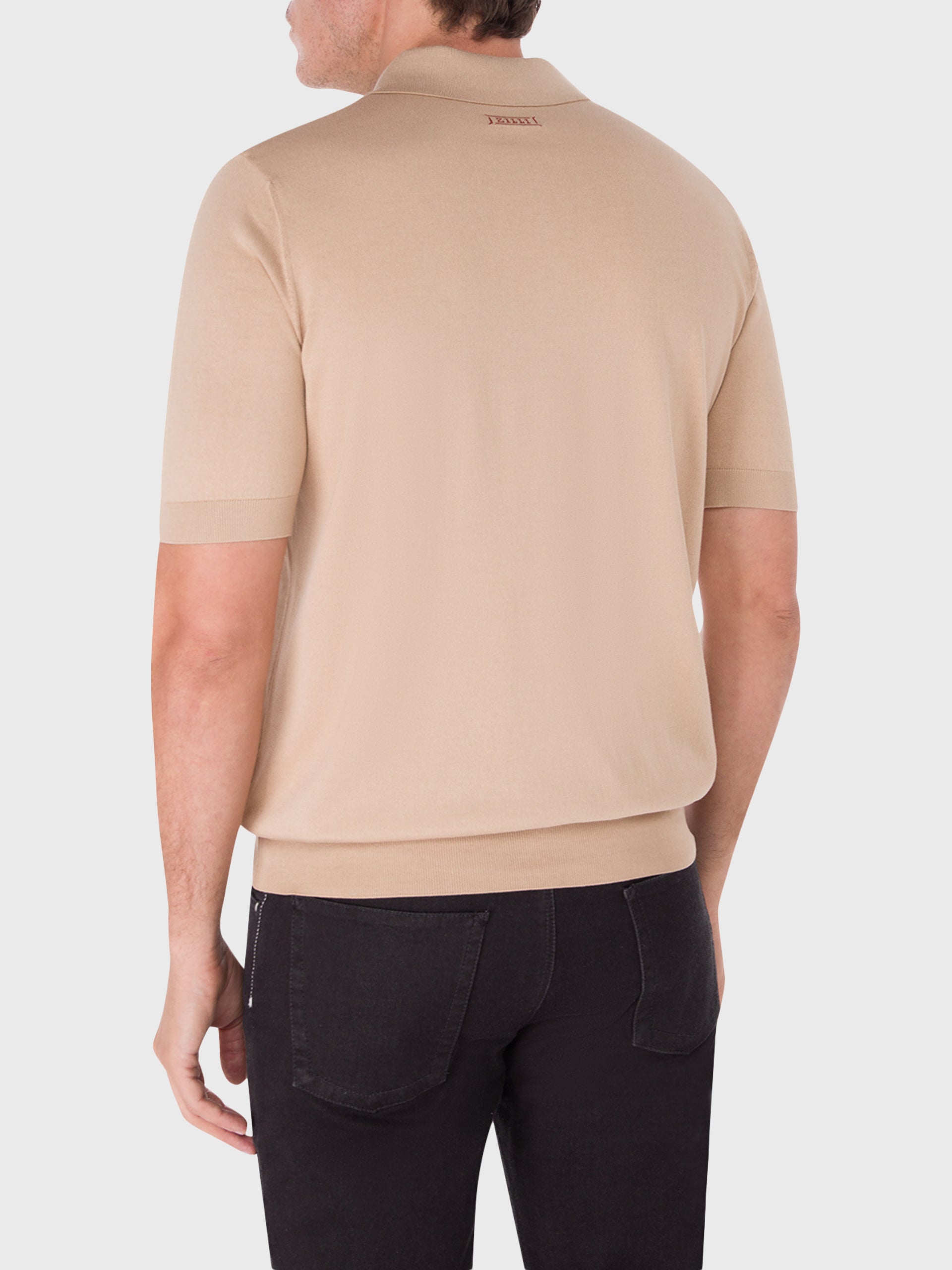 Поло с коротким рукавом на молнии и бриллиантовым узором