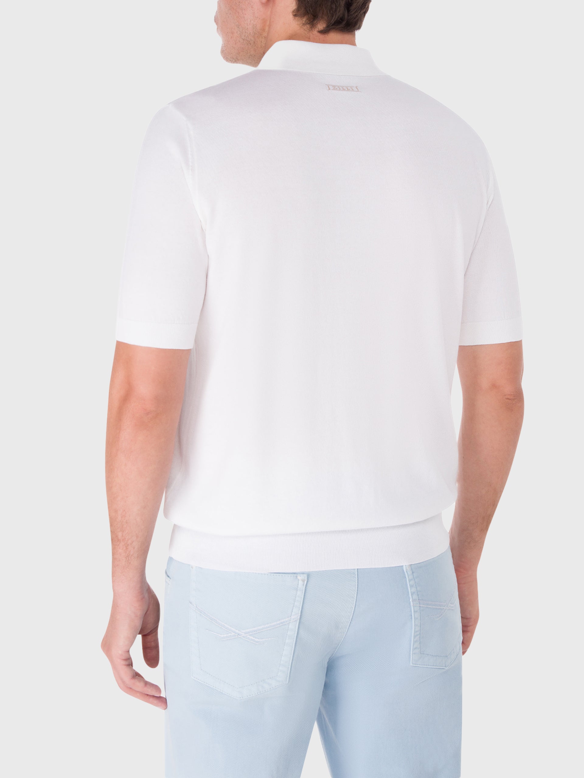 Поло с коротким рукавом на молнии и бриллиантовым узором