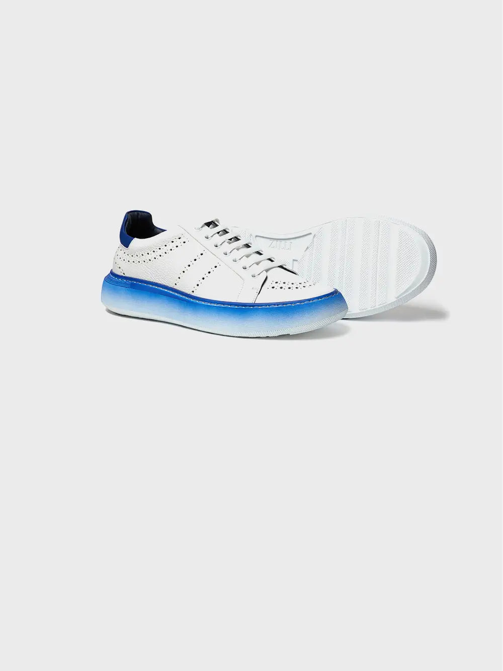 Zilli Italian White Perforated Leather Sneaker with Palladium-Finish Rivet