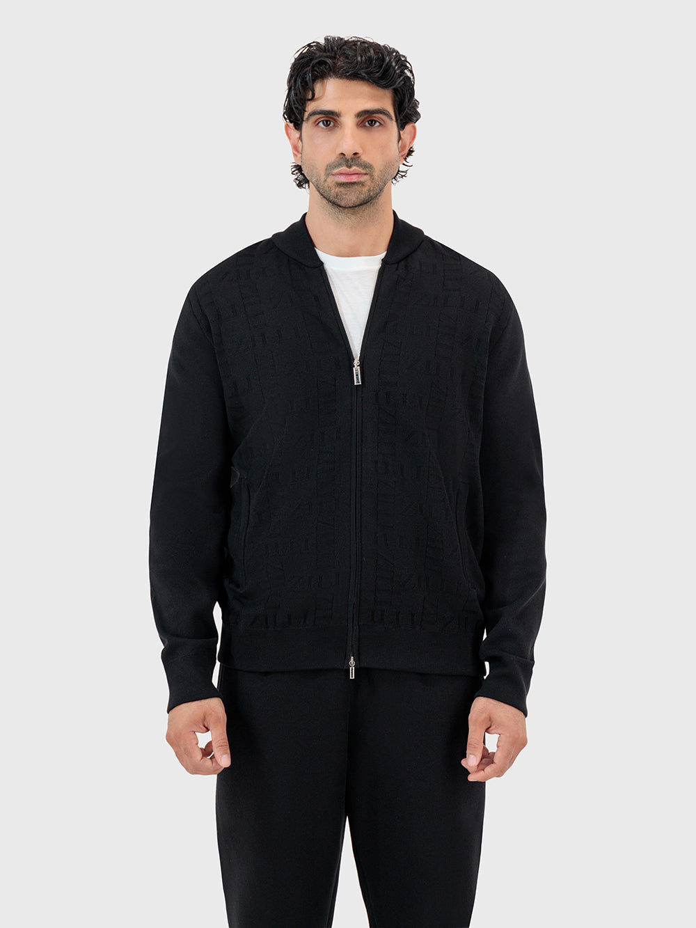 Спортивный костюм на молнии с поперечным рисунком