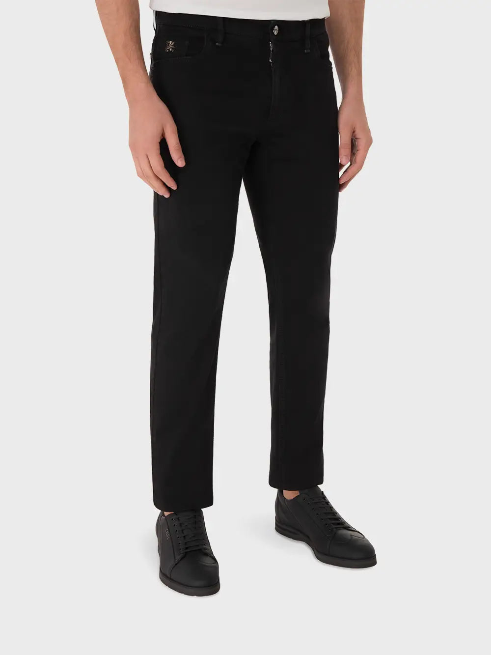 Джинсы с вышивкой в виде львиного круга