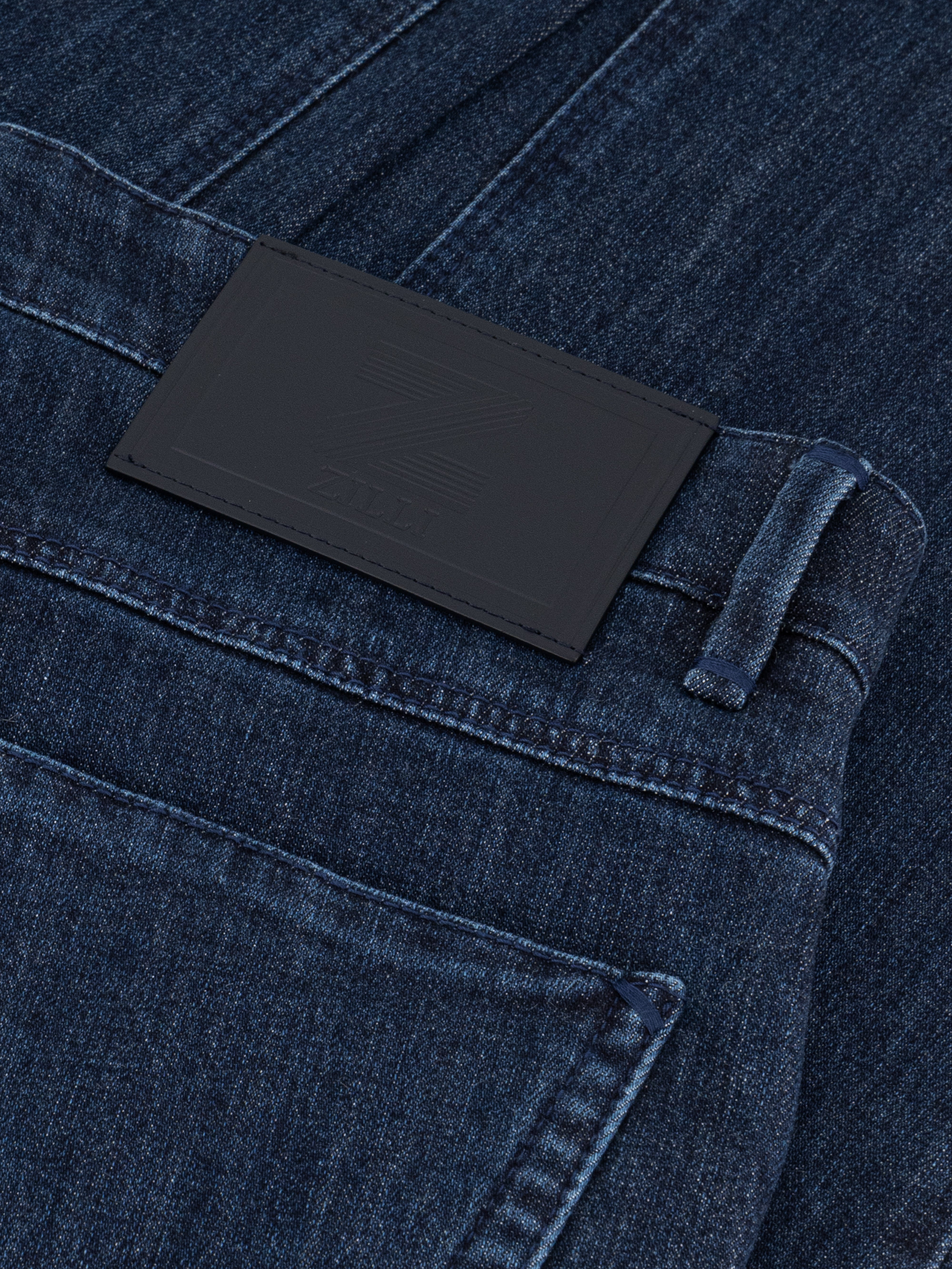 Джинсы с нашивкой в виде латунной буквы "Z" Синий