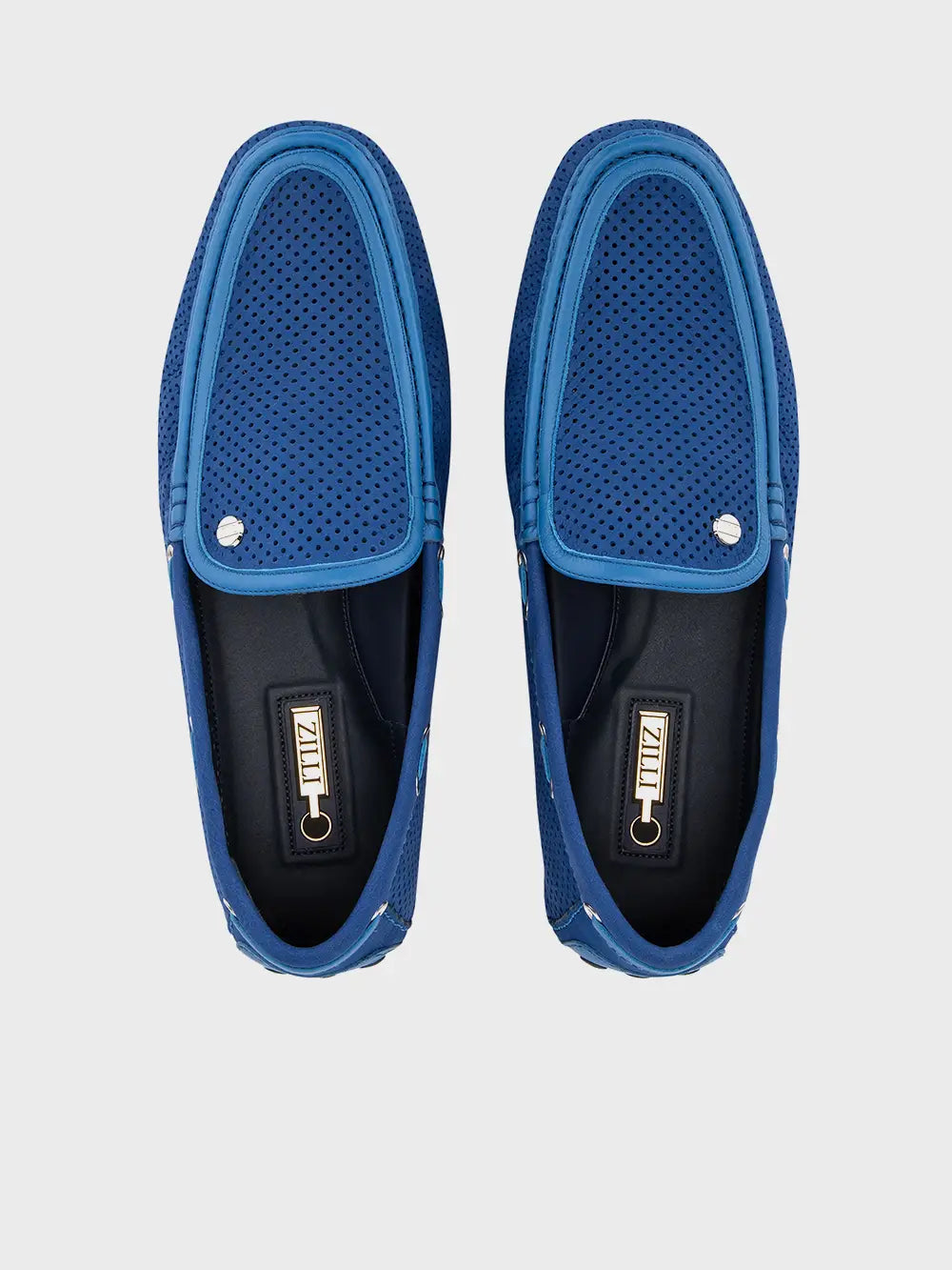 حذاء بدون كعب مثقوب من الجلد المدبوغ