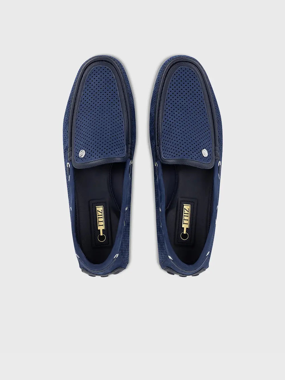 حذاء بدون كعب مثقوب من الجلد المدبوغ