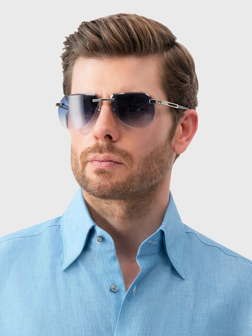 Солнцезащитные очки Navigator Shield без оправы — синий оттенок, серебристый
