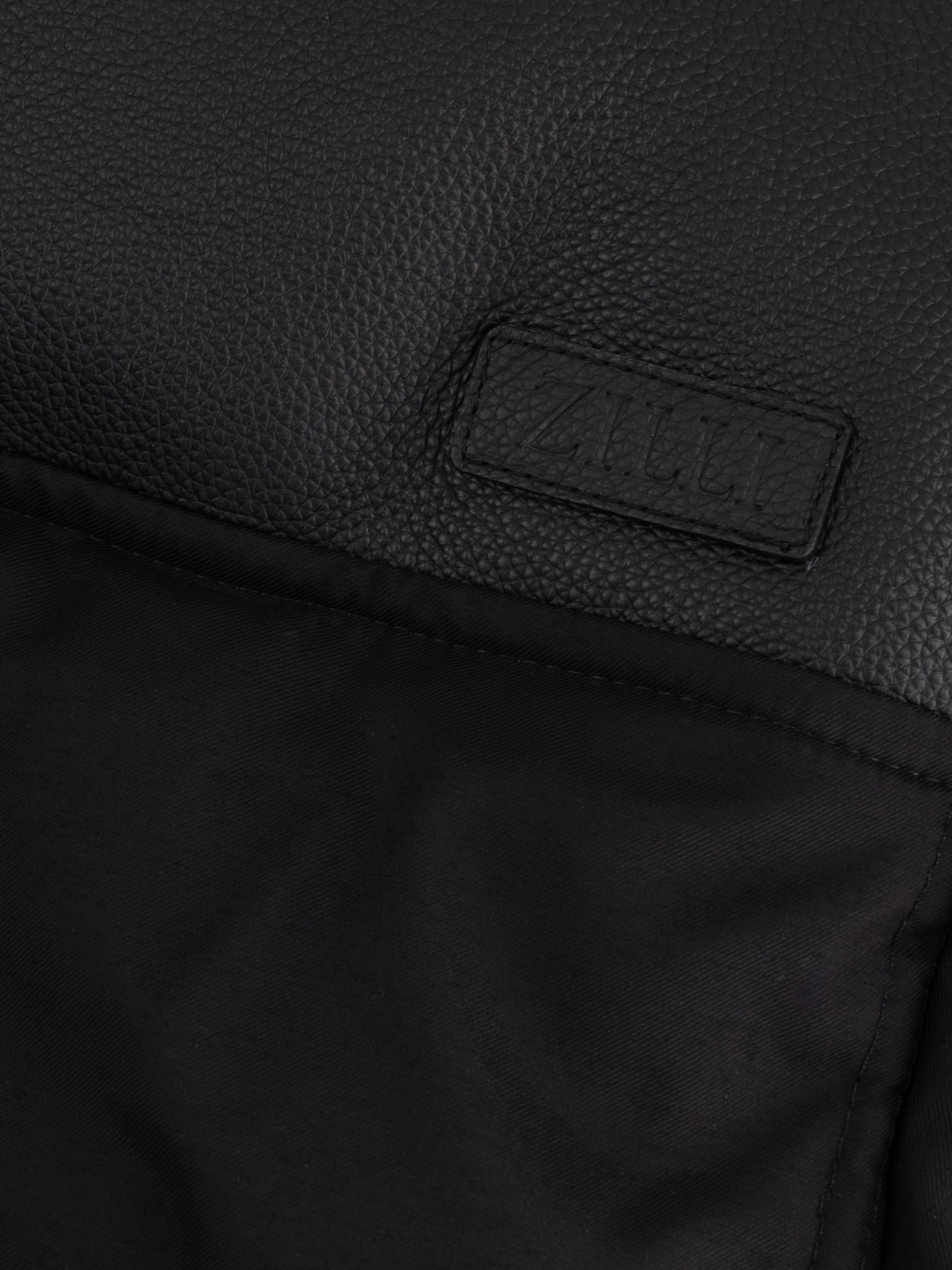 Стеганая шерстяная пуховая куртка черного цвета